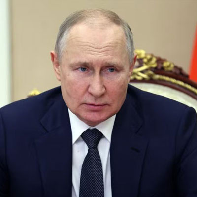 Russian President Vladimir Putin chairs a Security Council meeting via a video link in Moscow