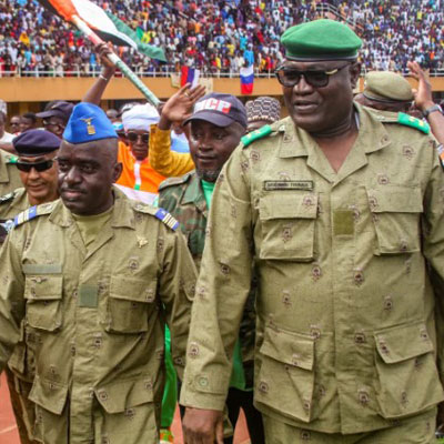 Members of the Nigerian military walking in procession